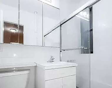 East 51 Street - Photo Thumbnail 3