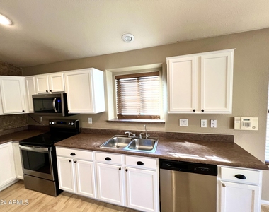 11210 E Pronghorn Avenue - Photo Thumbnail 4