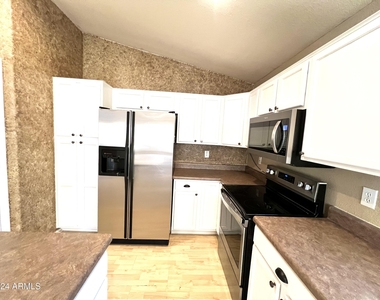 11210 E Pronghorn Avenue - Photo Thumbnail 7