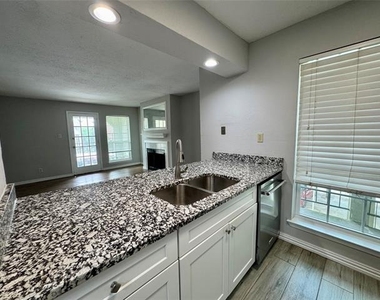 5981 Arapaho Road - Photo Thumbnail 4
