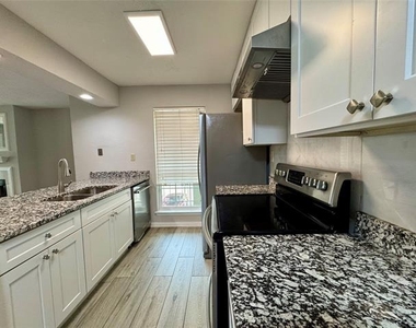 5981 Arapaho Road - Photo Thumbnail 2