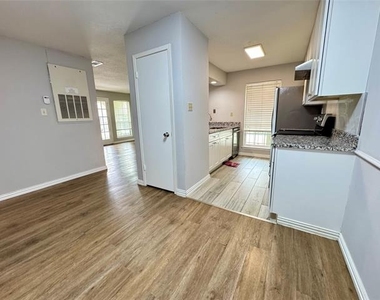 5981 Arapaho Road - Photo Thumbnail 3