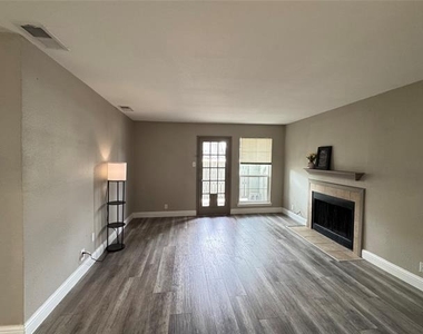 5981 Arapaho Road - Photo Thumbnail 2