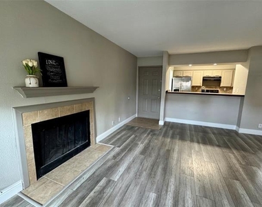 5981 Arapaho Road - Photo Thumbnail 3