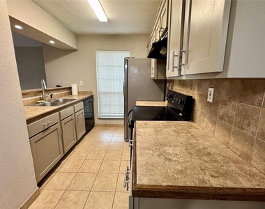5981 Arapaho Road - Photo Thumbnail 7