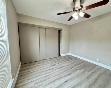 5981 Arapaho Road - Photo Thumbnail 14
