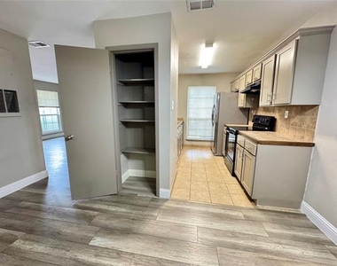 5981 Arapaho Road - Photo Thumbnail 12
