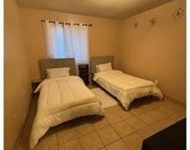 5615 Harvest Hill Road - Photo Thumbnail 4