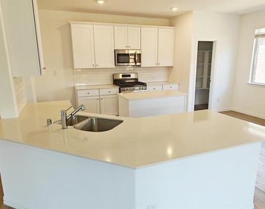 8404 Honeylocust Street - Photo Thumbnail 3