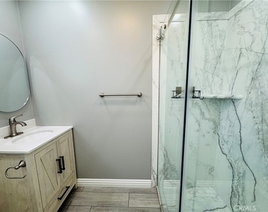 7515 Sunnybrae Avenue - Photo Thumbnail 11