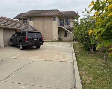 7802 Speer Avenue - Photo Thumbnail 1