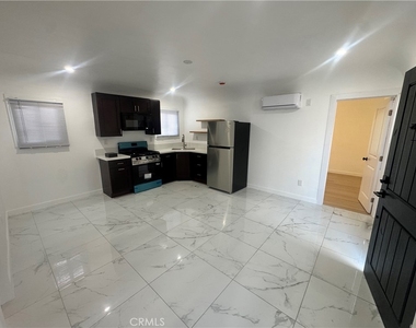 1018 E 79th - Photo Thumbnail 2