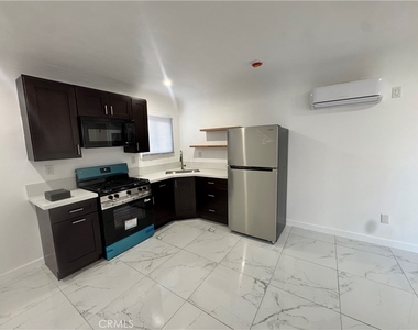 1018 E 79th - Photo Thumbnail 4