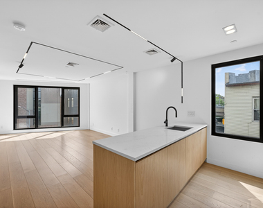 61 N Henry Street - Photo Thumbnail 1