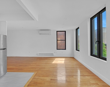 419 E 117th Street - Photo Thumbnail 3