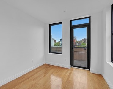 419 E 117th Street - Photo Thumbnail 6