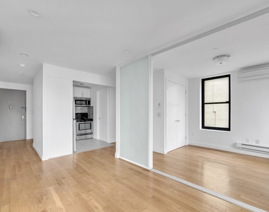 419 E 117th Street - Photo Thumbnail 2