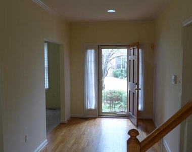 10008 Manor Place - Photo Thumbnail 3
