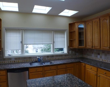 10008 Manor Place - Photo Thumbnail 9