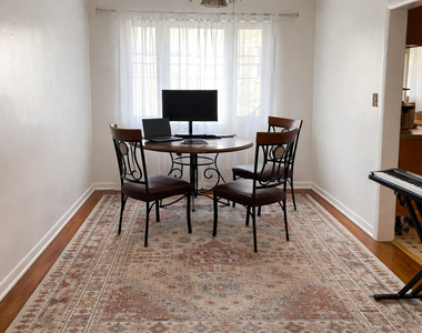 1706 W Jarvis Avenue - Photo Thumbnail 2