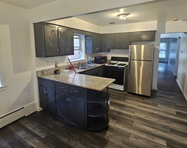 4933 Louise Street - Photo Thumbnail 1