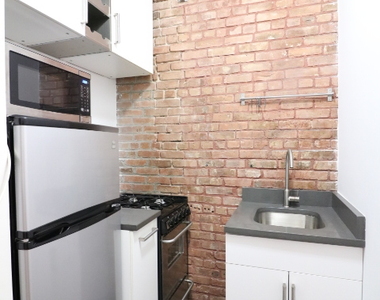 441 West 49th Street - Photo Thumbnail 3