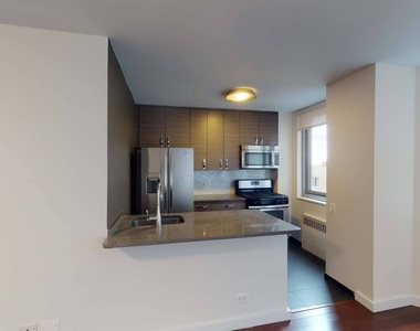 401 E 34th St - Photo Thumbnail 2