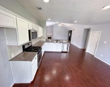 9418 Brackenton Crest Drive - Photo Thumbnail 5
