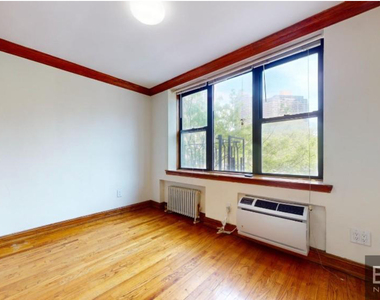 East 36th Street - Photo Thumbnail 2