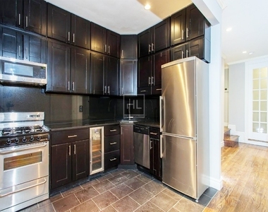 W 52nd St. - Photo Thumbnail 7