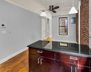 W 52nd St. - Photo Thumbnail 3