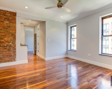 E 6th St. - Photo Thumbnail 2