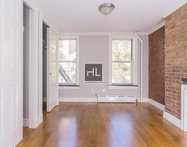 E 7th St. - Photo Thumbnail 2