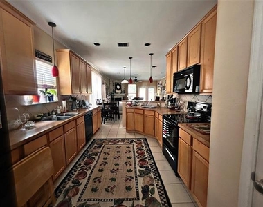5817 Quicksilver Drive - Photo Thumbnail 2