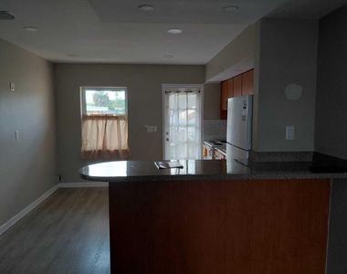 5749-5753 Grant Street - Photo Thumbnail 4