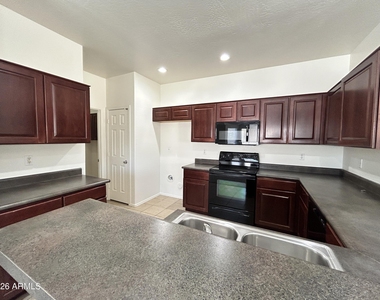 17218 W Country Gables Drive - Photo Thumbnail 3