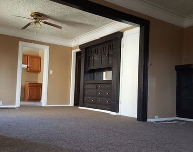 4240 S Denker Avenue - Photo Thumbnail 2