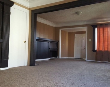4240 S Denker Avenue - Photo Thumbnail 1