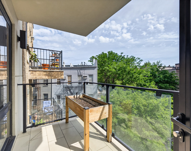 61 N Henry St - Photo Thumbnail 8