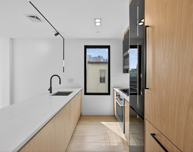 61 N Henry St - Photo Thumbnail 4