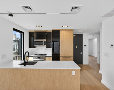 61 N Henry St - Photo Thumbnail 3