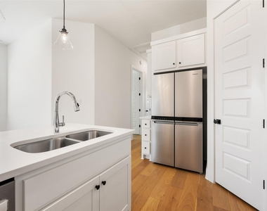 308 E 19th 1/2 St - Photo Thumbnail 16