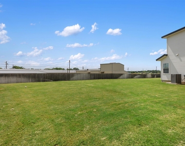 308 E 19th 1/2 St - Photo Thumbnail 26