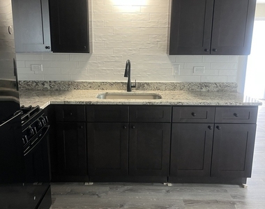 8112 W Marion Street - Photo Thumbnail 1