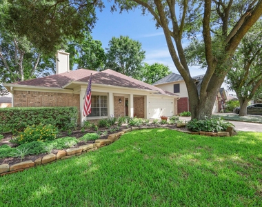 8910 Driftstone Drive - Photo Thumbnail 1