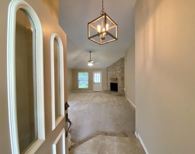 8646 Sunny Ridge Drive - Photo Thumbnail 2