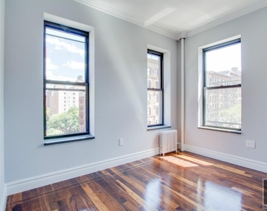 E 6th St. - Photo Thumbnail 2