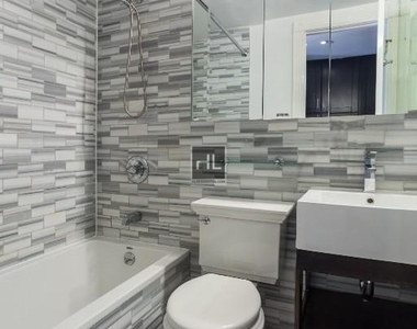 E 7th St. - Photo Thumbnail 4