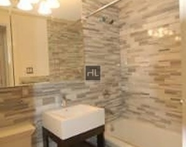 E 7th St. - Photo Thumbnail 3