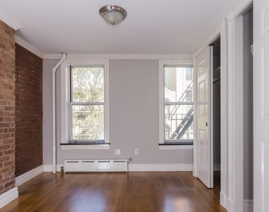 E 7th St. - Photo Thumbnail 2